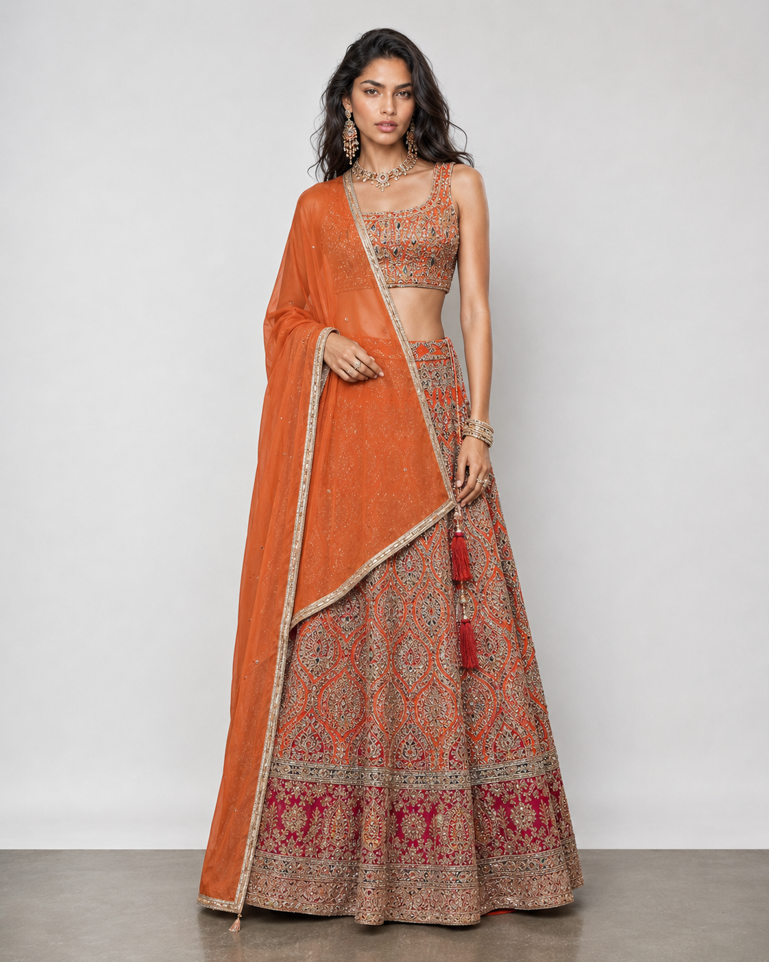 Rust Raw Silk Lehenga Choli with Jardoshi Resham Motiwork