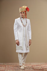 Ivory sherwani set embroidered in geoetic motif