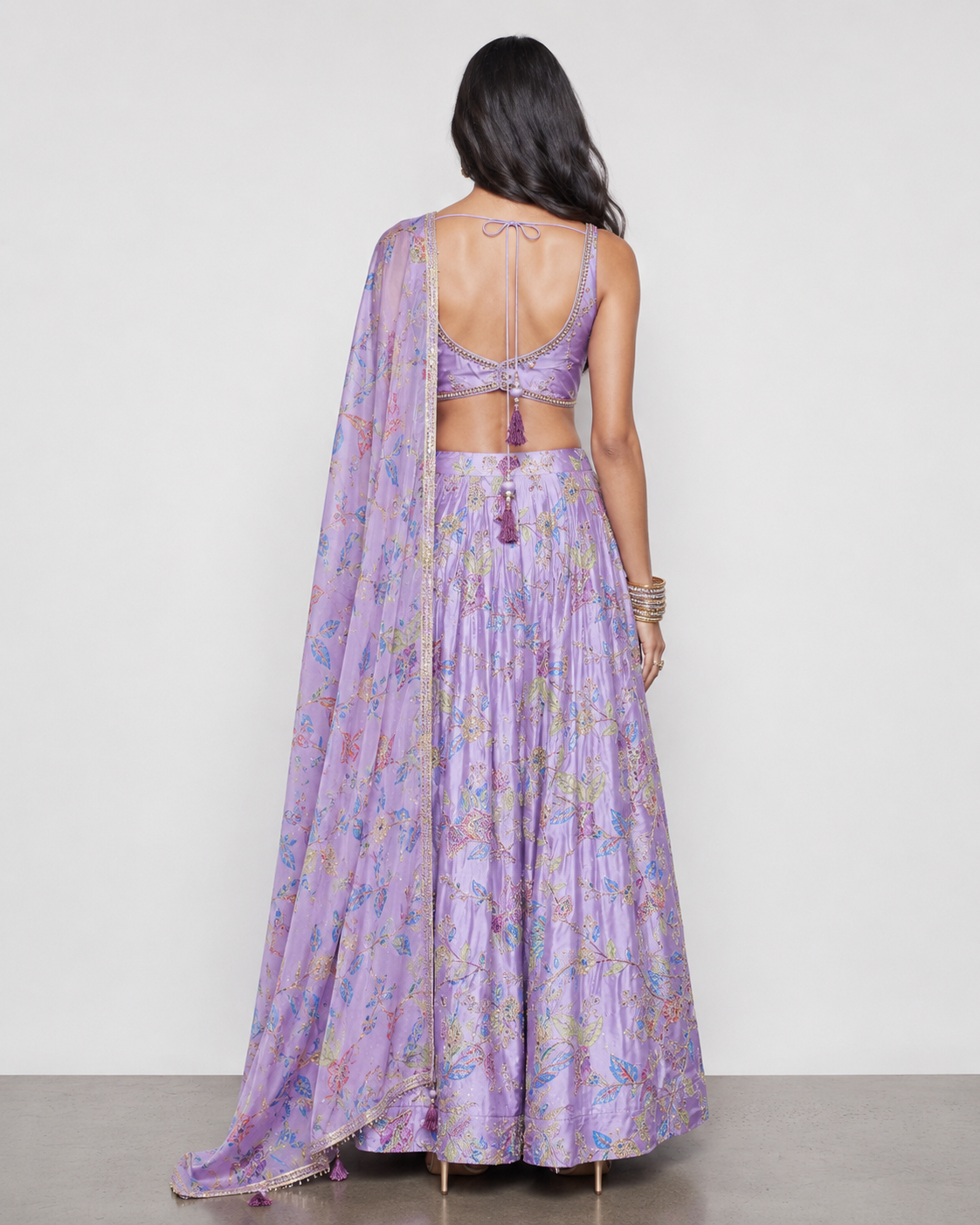 Lavender Soft Silk Lehenga Choli with Miral, Jardoshi and Sicon Work Flowers Print