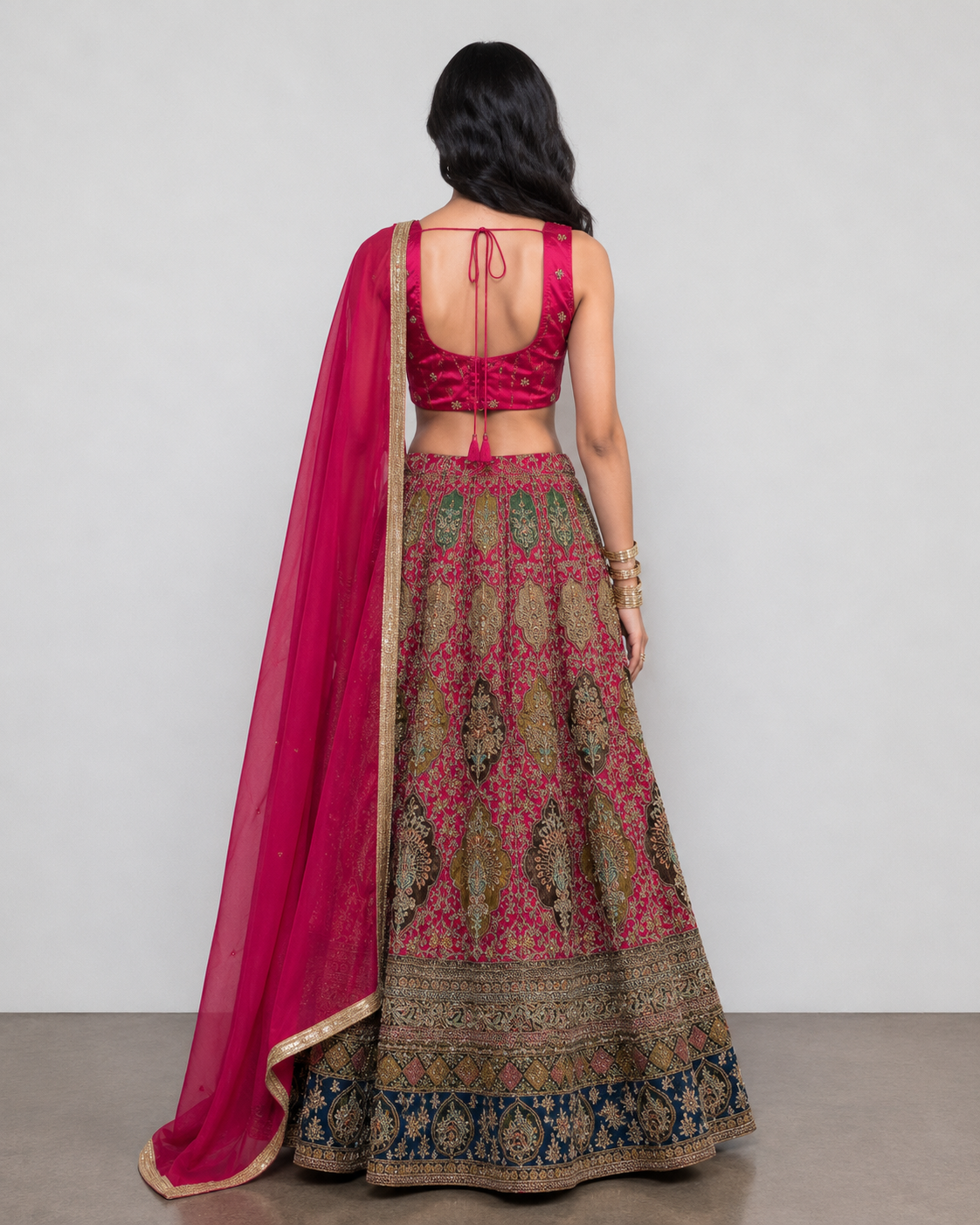 Rani Crap Silk Lehenga Choli with Jardoshi, Reshan, and Kardana work