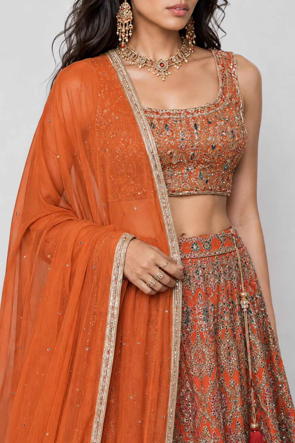 Rust Raw Silk Lehenga Choli with Jardoshi Resham Motiwork