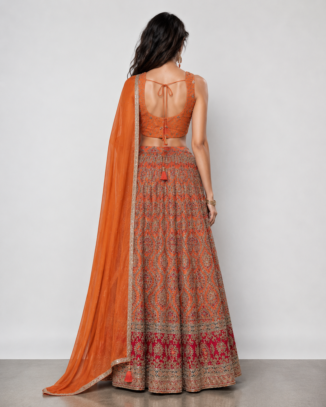 Rust Raw Silk Lehenga Choli with Jardoshi Resham Motiwork