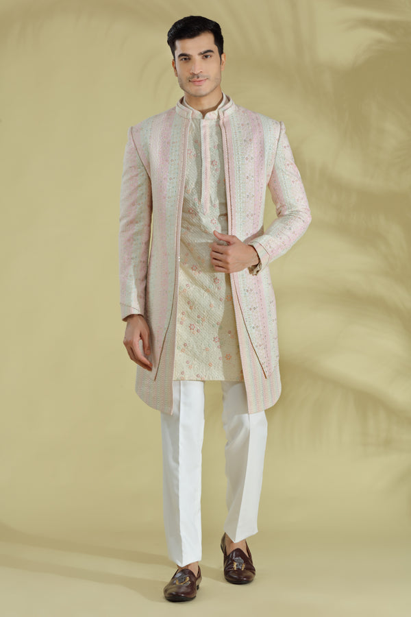 Pastel indowestern double layred jacket with short kurta , intricately embroidered with resham thread work and sequins.